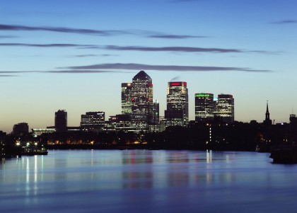 View of Thames river in London and Canary Wharf towers